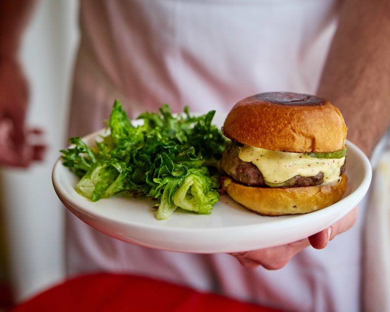 Dry aged burger on a plate