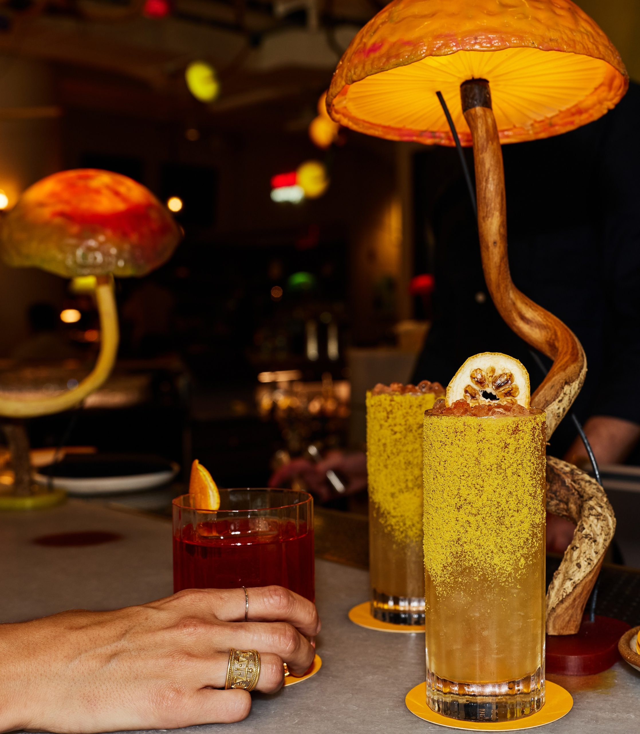Cocktail being served on the bar at Manuela NYC