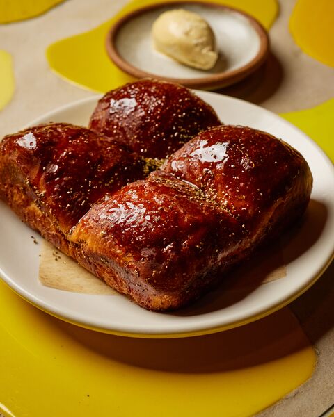 cream biscuits with butter on a plate