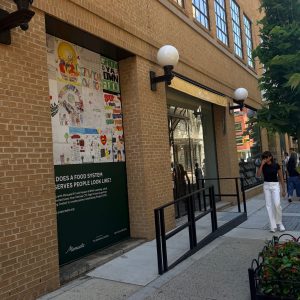 The poster installation on view at Manuela