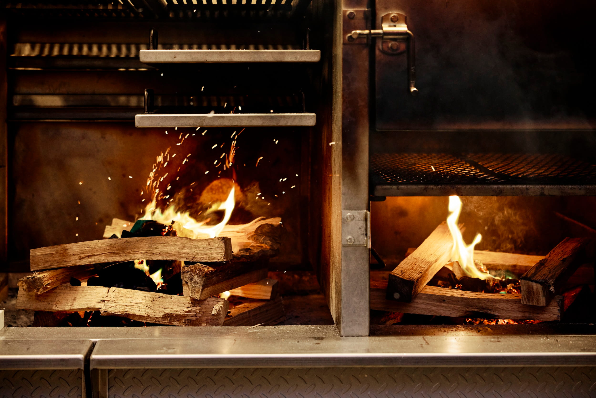 Close up of the wood-fired grill at Manuela